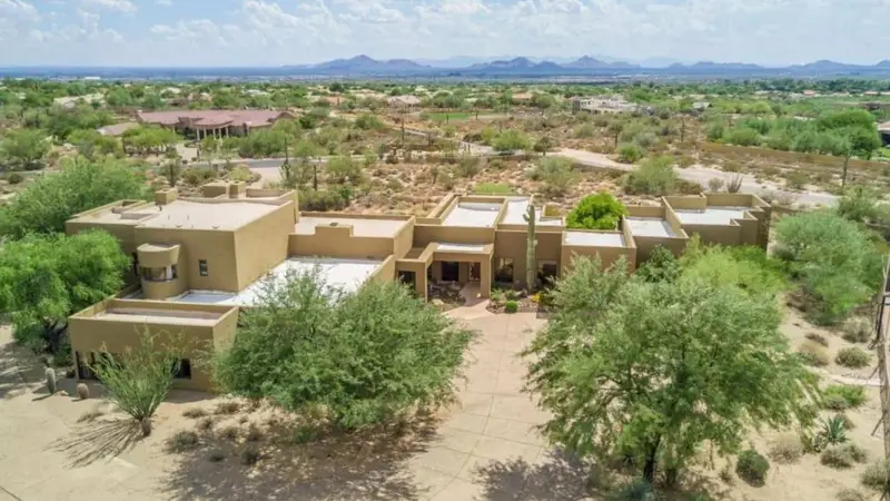 Aerial view of homes on large desert lots in Desert Hills, Arizona
