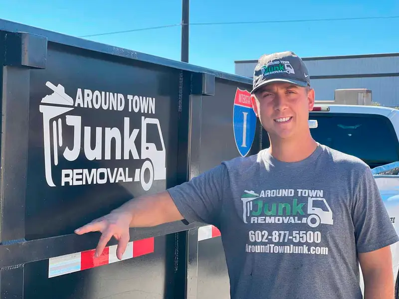 Around Town Junk Removal crew member next to the junk removal truck